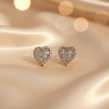10K white gold diamond heart stud earrings with baguette center and round brilliant pavé border, angle 2