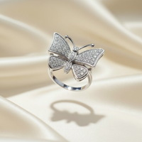 10K White Gold Diamond Pavé Butterfly Ring — angled view showing body and wing depth
