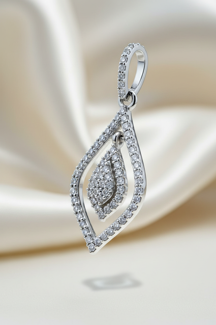 10K white gold .25ctw diamond open teardrop floating cluster pendant, three-quarter side view