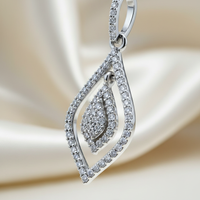 10K white gold .25ctw diamond open teardrop floating cluster pendant, three-quarter side view