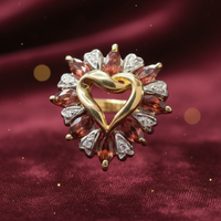 10K yellow gold open heart garnet sunburst diamond ring luxury editorial marketing photo