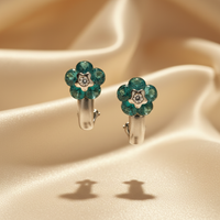 14K White Gold Blue Topaz & Diamond Flower Earrings - Angle View