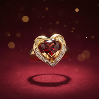 10K yellow gold heart garnet diamond ring luxury editorial marketing photo