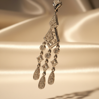 14K white gold Art Deco diamond chandelier pendant - left angle editorial