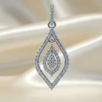 10K white gold .25ctw diamond open teardrop floating cluster pendant, top-down view