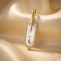 DOV 18K yellow gold mother-of-pearl diamond star and moon pendant, angled view