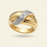 14K yellow gold triple band diamond crossover ring floating on ivory backdrop luxury editorial marketing image
