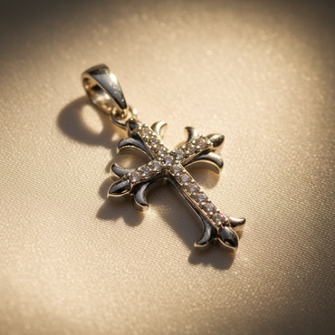 10K white gold ornate fleur-de-lis diamond cross pendant with pavé diamonds and dark oxidized accents, angle 1