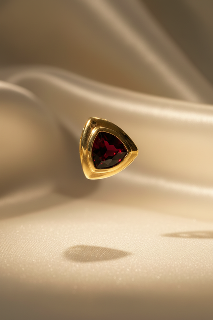 14K yellow gold trillion garnet bezel section cap removed