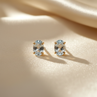 14K yellow gold oval aquamarine stud earrings - editorial marketing image 3