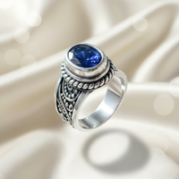 Sterling Silver Oval Blue Sapphire Bali Ring — angled three-quarter view