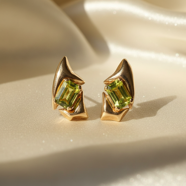 14K yellow gold sculptural peridot earrings - editorial marketing image