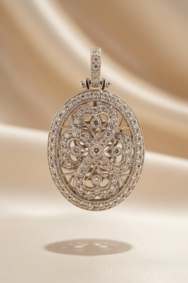 18K white gold .56ctw diamond art deco oval filigree locket, front view