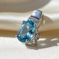 14K white gold oval blue topaz and pink tourmaline pendant, three-quarter angle