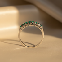 18K White Gold Eight-Stone Emerald Ring - editorial side profile
