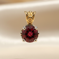 14K two-tone gold round garnet pendant face-up view
