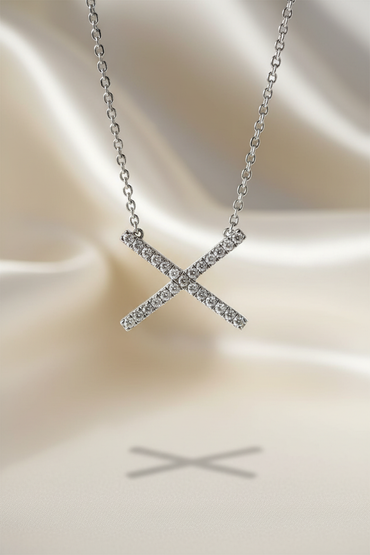 Diamond X pendant sterling silver editorial marketing image