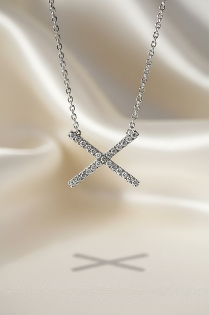 Diamond X pendant sterling silver editorial marketing image