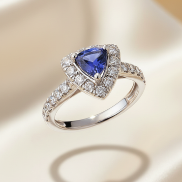 18K white gold trillion tanzanite and .36ctw diamond halo ring, elevated view