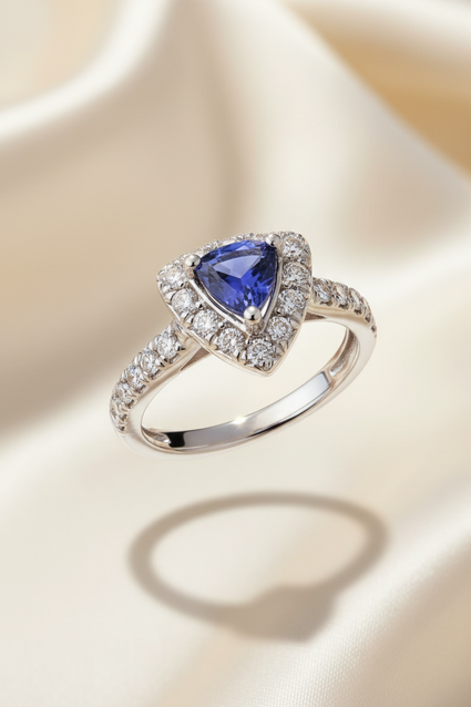 18K white gold trillion tanzanite and .36ctw diamond halo ring, elevated view