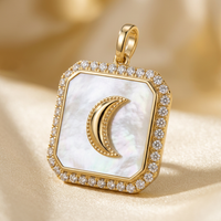 18K yellow gold white mother-of-pearl and diamond crescent moon pendant, angled view