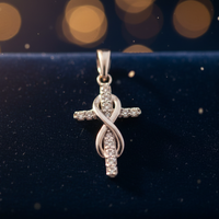 1/10 CTW Diamond Infinity Cross Pendant in 10K White Gold