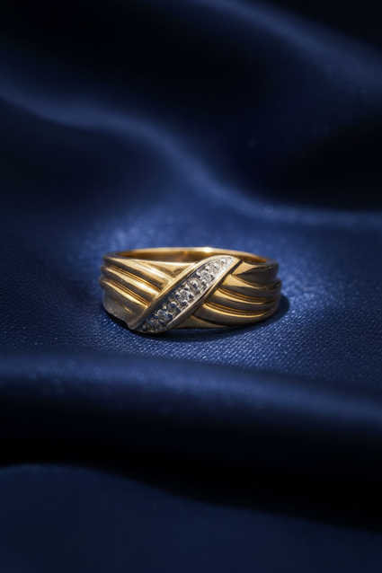 10K Yellow Gold Men's Two-Tone Diamond Crossover Ring on midnight blue silk backdrop editorial marketing image