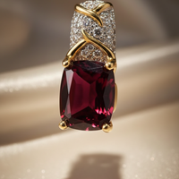 14K two-tone gold garnet and pink topaz diamond pendant front view