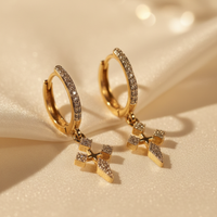 14K Yellow Gold 1/6ctw Diamond Cross Huggie Earrings - angle 1