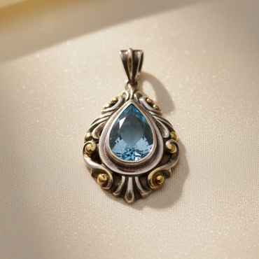 Sky Blue Topaz Scrollwork Teardrop Pendant