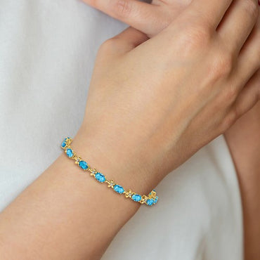 14k Floral Diamond and Blue Topaz Bracelet