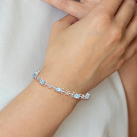 Sterling Silver Rhodium-plated Blue Topaz Oval Bracelet